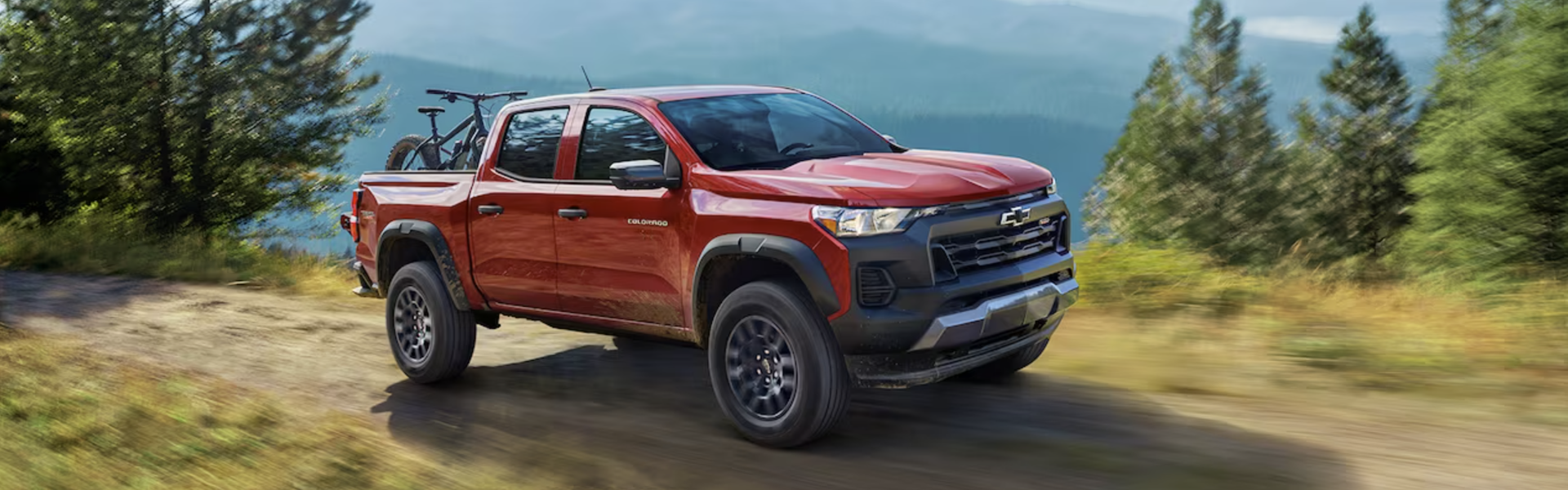 2024 Chevy Colorado in red running on road